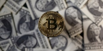 Bitcoin tops $11,000, but fades after sharp rally